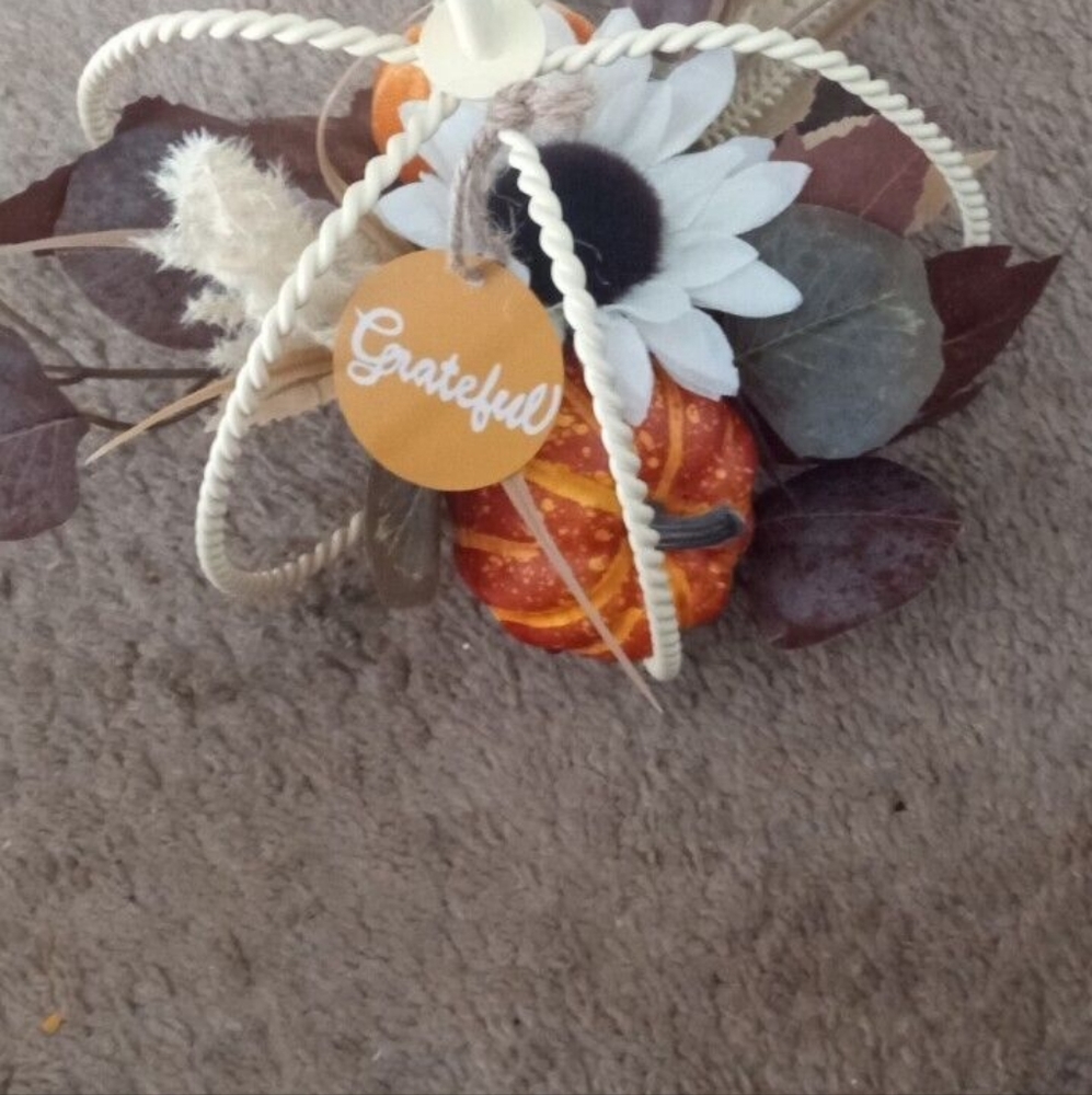 little pumpkin metal with faux flowers